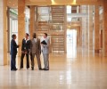 photodune-183218-team-of-successful-business-people-standing-at-a-hallway-m